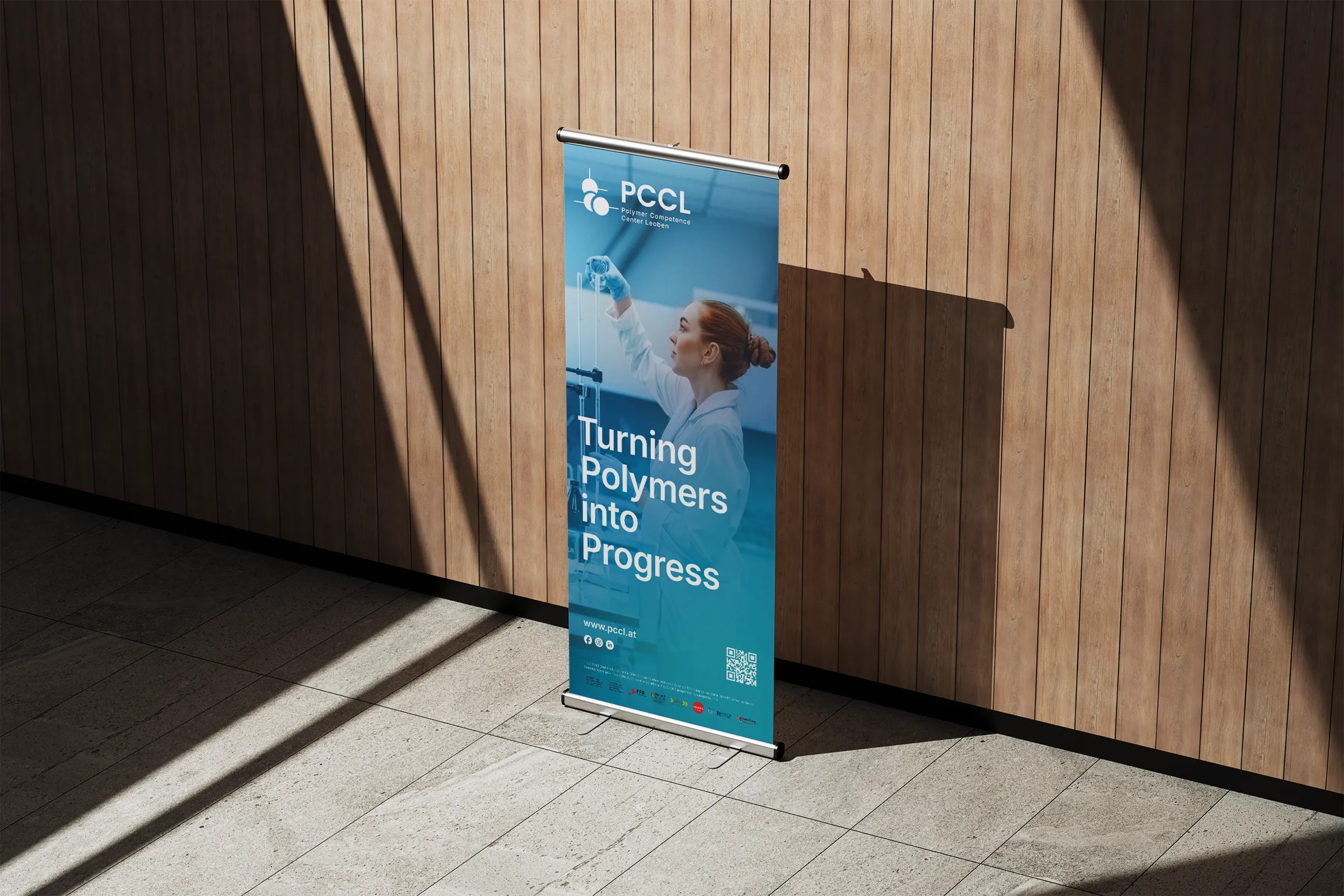 Roll-Up für Messeauftritte mit Logo und Claim für das PCCL